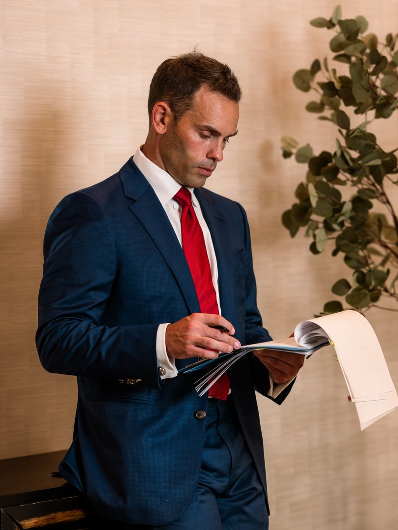 Dr. Travis Boyd reviewing plastic surgery patient consultation at Renaissance Plastic Surgery