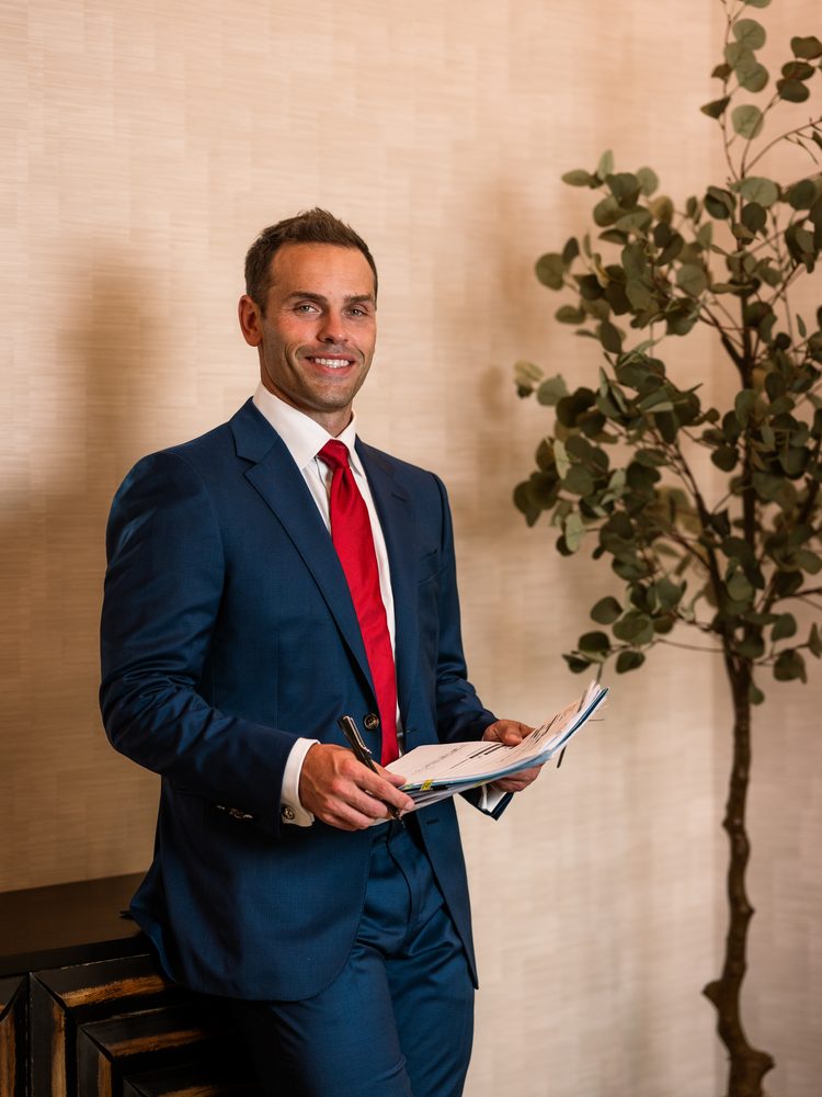 Dr. Travis Boyd reviewing breast reconstruction and implant options with patient